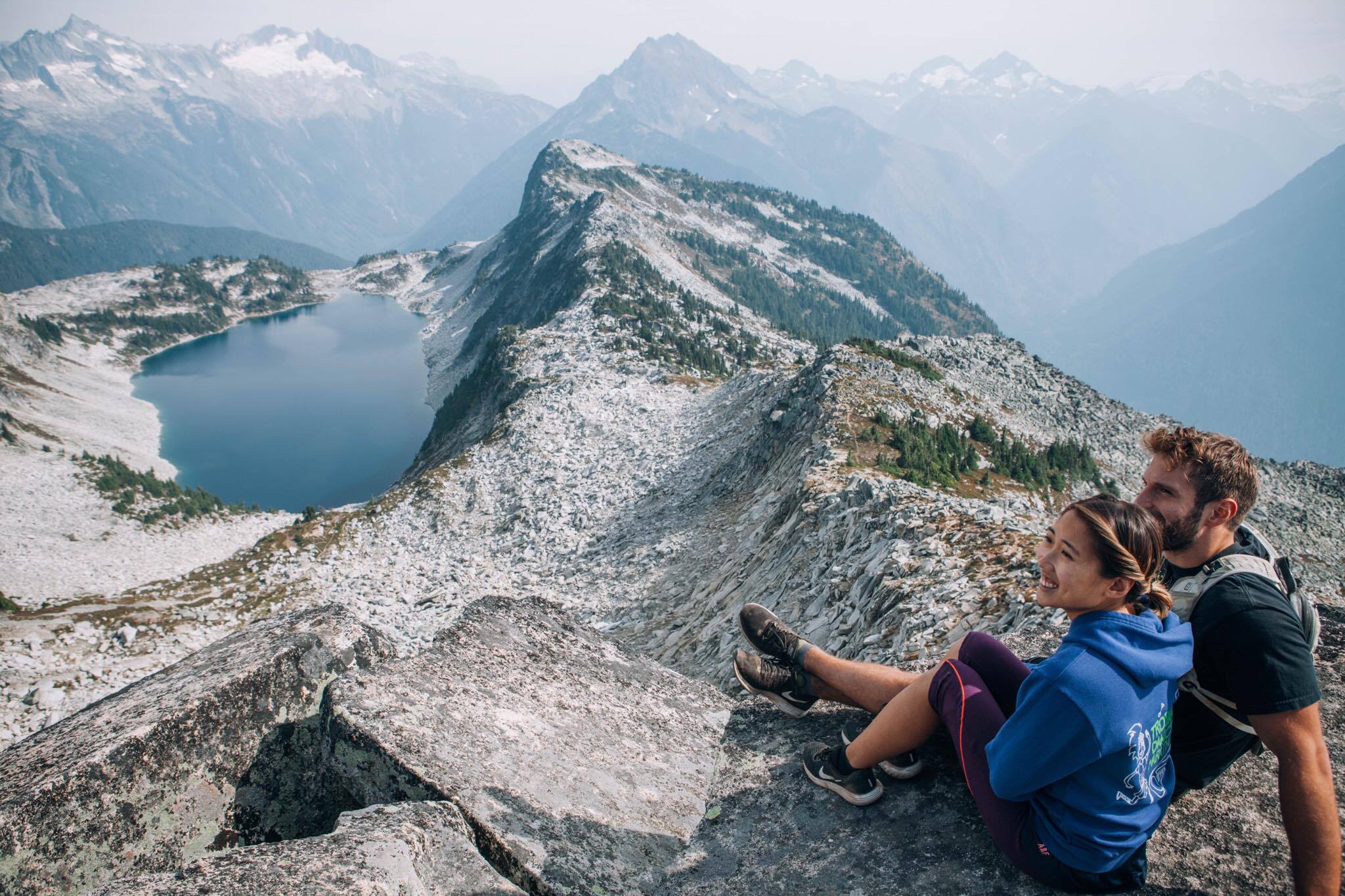 couple sitting overlooking Hidden Lake